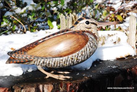 Bcasse dans la neige en bois sucuplt et peinte  la main par Eric GERARD.